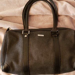 Authentic Gucci Denim/Leather duffle style purse